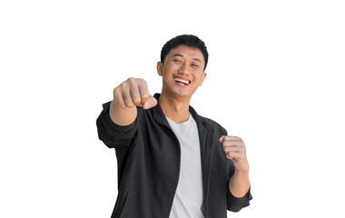 Young Asian man in black coat making happy fist gesture forward on white background. Concept of happiness, positive energy, good mood. Thai man.