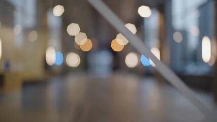 Abstract office reflection with neutral glass tones and cinematic bokeh, elegant minimal background perfect for corporate visuals and brand storytelling