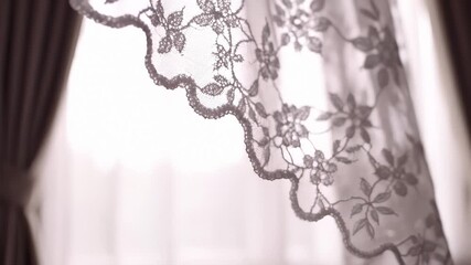 Close-Up View of White Lace Curtain Moving Gently in the Breeze - Powered by Adobe