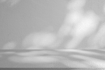 close up mockup studio with shadow light form window at living room  of white plain concrete wall texture and tabletop for show product on display background concept