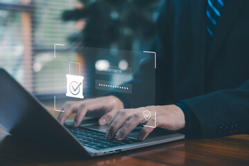 Businessman typing on laptop with digital login interface, illustrating cybersecurity, data protection, secure access, authentication, online privacy concept. technology solutions, cyber information