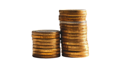 Two short stacks of golden coins against stark black backdrop