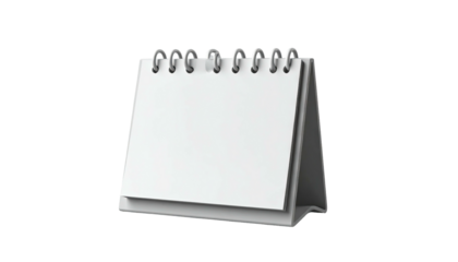 Blank white desk calendar with metal rings on a black background