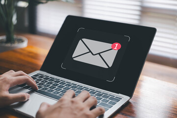 Newsletter notification and open mail from the laptop. concept of correspondence, and news for...