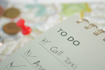 Checklist for daily tasks with coins and pins visible