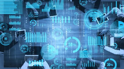 Aerial perspective of business professionals working on laptops with data visualizations and graphs around them, representing teamwork and analytics in a modern office environment. Xenic - Powered by Adobe