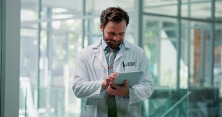 Thinking, doctor and man in hospital, tablet and internet with connection, solution or healthcare. Person, medical service or professional in clinic, choice or decision with email for online schedule - Powered by Adobe