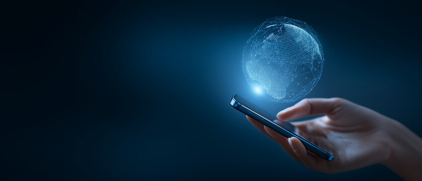 Hand holding smartphone displaying holographic digital globe with glowing network connections - Powered by Adobe