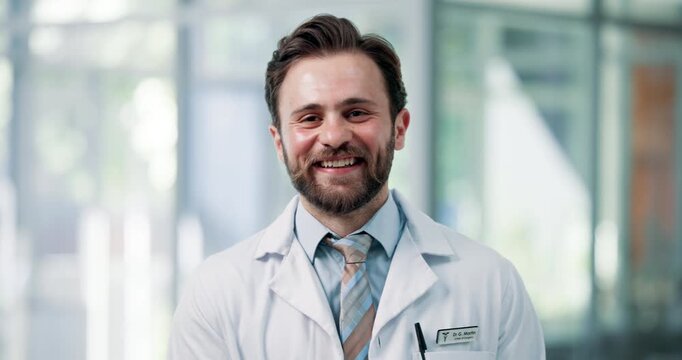 Happy, man and face of doctor in hospital with confidence for healthcare career with service. Professional, smile and portrait of male surgeon with pride for medical help in clinic in Germany.