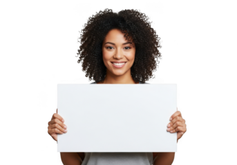 Smiling young woman with curly dark hair holding a blank white sign for your message isolated on transparent background