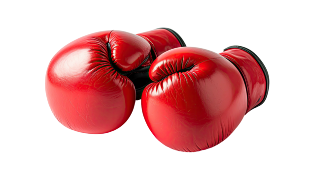 Two bright red boxing gloves overlapping on a black background