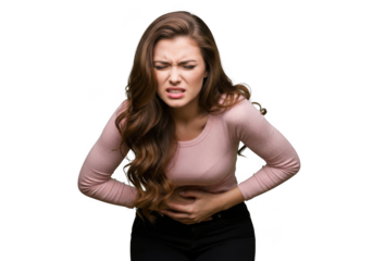 Young woman grimacing in pain holding her abdomen showing discomfort and stomach ache isolated on transparent background