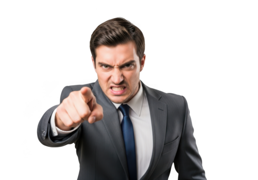 Furious businessman in a suit accusingly points finger forward demonstrating anger and frustration isolated on transparent background