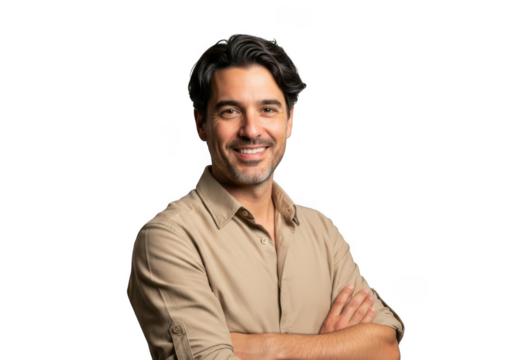 A smiling man with dark hair and a light brown collared shirt stands with his arms crossed isolated on transparent background