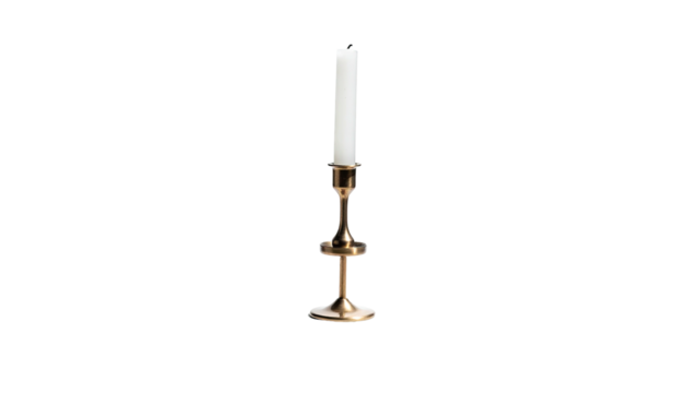 Candle stands tall in a simple brass holder on black background