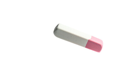 Rectangular white/pink eraser against stark black background