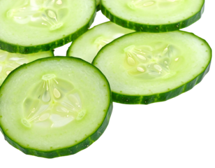 Close-up of several green, circular slices of a cucumber, some overlapping and isolated, with visible seeds and textured skin