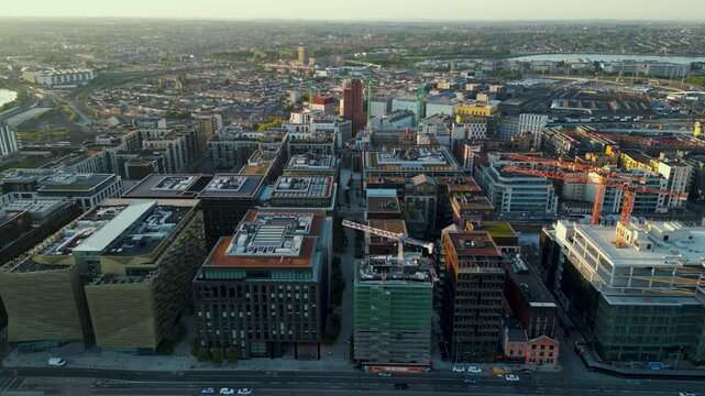 Aerial view of a new business area of Dublin - Modern new building on the banks of Liffey River in Point Village or East Wall area - Dublin city centre