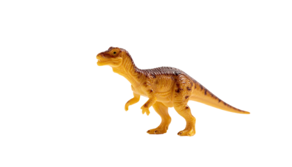 Small, tan, two-legged dinosaur figurine stands against dark backdrop