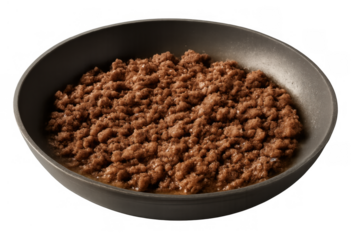 Cooked ground beef, also known as minced meat, served in a dark pan or bowl, rich in protein, with a transparent background
