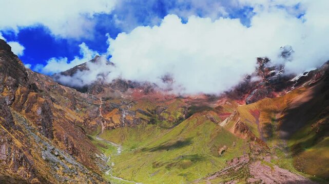 Peruvian Andes range Laguna Lake Humantay trek snow capped high altitude glacier Humantay Salkantay mountain trek Peru aerial drone rainy season sunny morning fog clouds hiking Cusco forward upwards