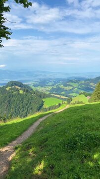 Hiking trail in the Swiss Alps on the way to alpine peaks Bachtel Switzerland nature