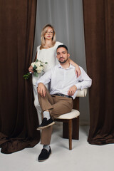 A wedding portrait of the newlyweds. Portrait of a guy and a girl in love	