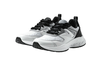 Pair of monochrome sporty athletic shoes against black backdrop