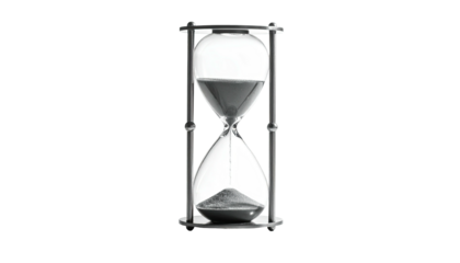 Hourglass sand flowing, time passing. Monochrome