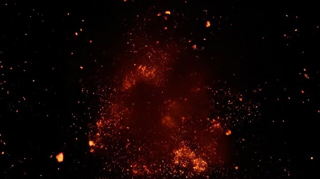 Dramatic volcano eruption spewing lava and smoke at night, a fiery landscape.