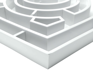 Close-up view of a stark white, three-dimensional maze, focusing on corners and pathways, casting shadows