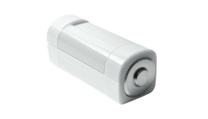 White cylinder block, rounded edges, silver dot on end, low angle