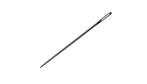 Pair of chopsticks laying diagonally on a black background