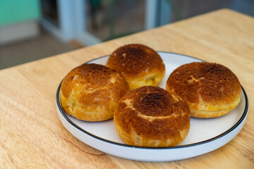Serving Cream Puffs on Plate Delicious Homemade Dessert Ready to Eat