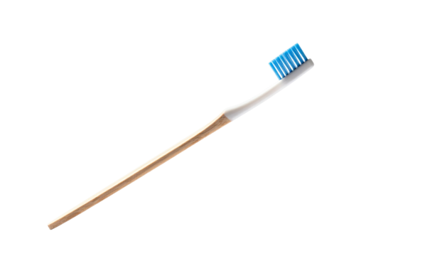 Beige-handled toothbrush with blue bristles on black backdrop
