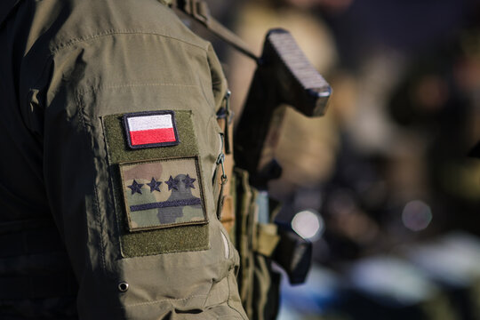 Details with the patch of a Polish soldier during a NATO Multinational Exercise.