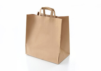 Plain kraft paper shopping bag with handles on a clean white background. Eco-friendly packaging concept for retail, delivery, gifts, or branding. Minimalistic studio shot of a reusable paper bag.