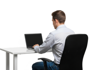 Young man working on laptop computer while seated at a desk in an office environment isolated on transparent background