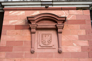 Eagle coat of arms at pier of Eiserner Steg footbridge at German city of Frankfurt on an autumn...