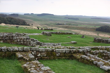 Landscape view of ancient monument Hadrian’s Wall. the rugged Scottish highland countryside, a...