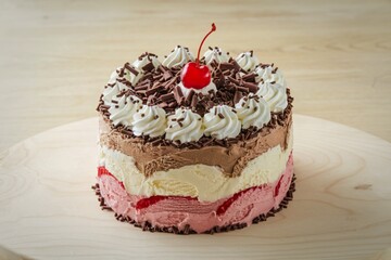 ice cream cake with a cherry on top