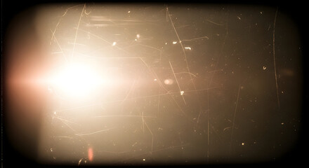 Vintage film frame with light leak and scratches, evoking a sense of nostalgia and retro aesthetic, perfect for adding an oldfashioned touch