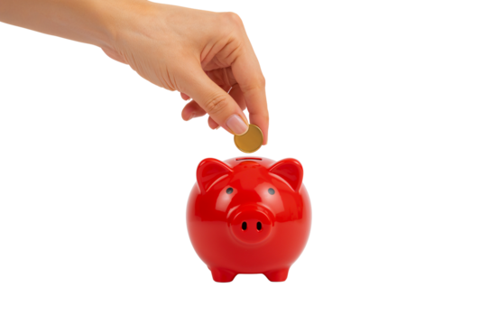 Hand dropping a gold coin into a bright red piggy bank. Focus on financial savings, budgeting, and personal wealth goals.