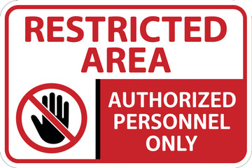 A red and white sign warns that the area is restricted to authorized personnel only, with a prohibition symbol.