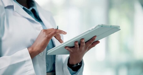 Hands, doctor and typing with tablet for medical history, patient report or records in hospital. Clinic, woman and healthcare worker with tech for research, insurance information and check schedule - Powered by Adobe