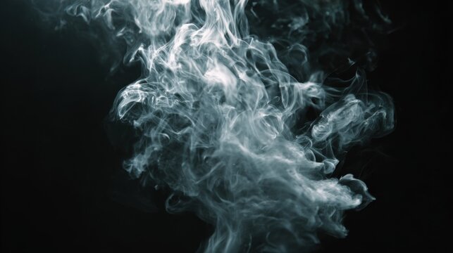 Captivating smoke patterns swirl gracefully against a dark backdrop creating an abstract art piece in motion