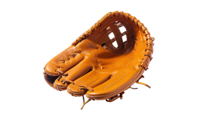 Worn leather baseball glove against a stark black background