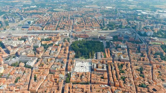 Bologna, Italy. Old Town. Piazza dell Otto Agosto - market square. Panoramic view of the city. Summer. Drone footage