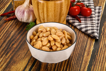 Baked white canned beans in the bowl