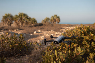 drones gather morning dew to provide water in parched region under bright morning sun